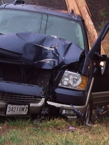 Cop: "Son, Why dont you come sit in the back of the car and get out of this rain?".....John: "No, No thats okay im alright thanks anyway"